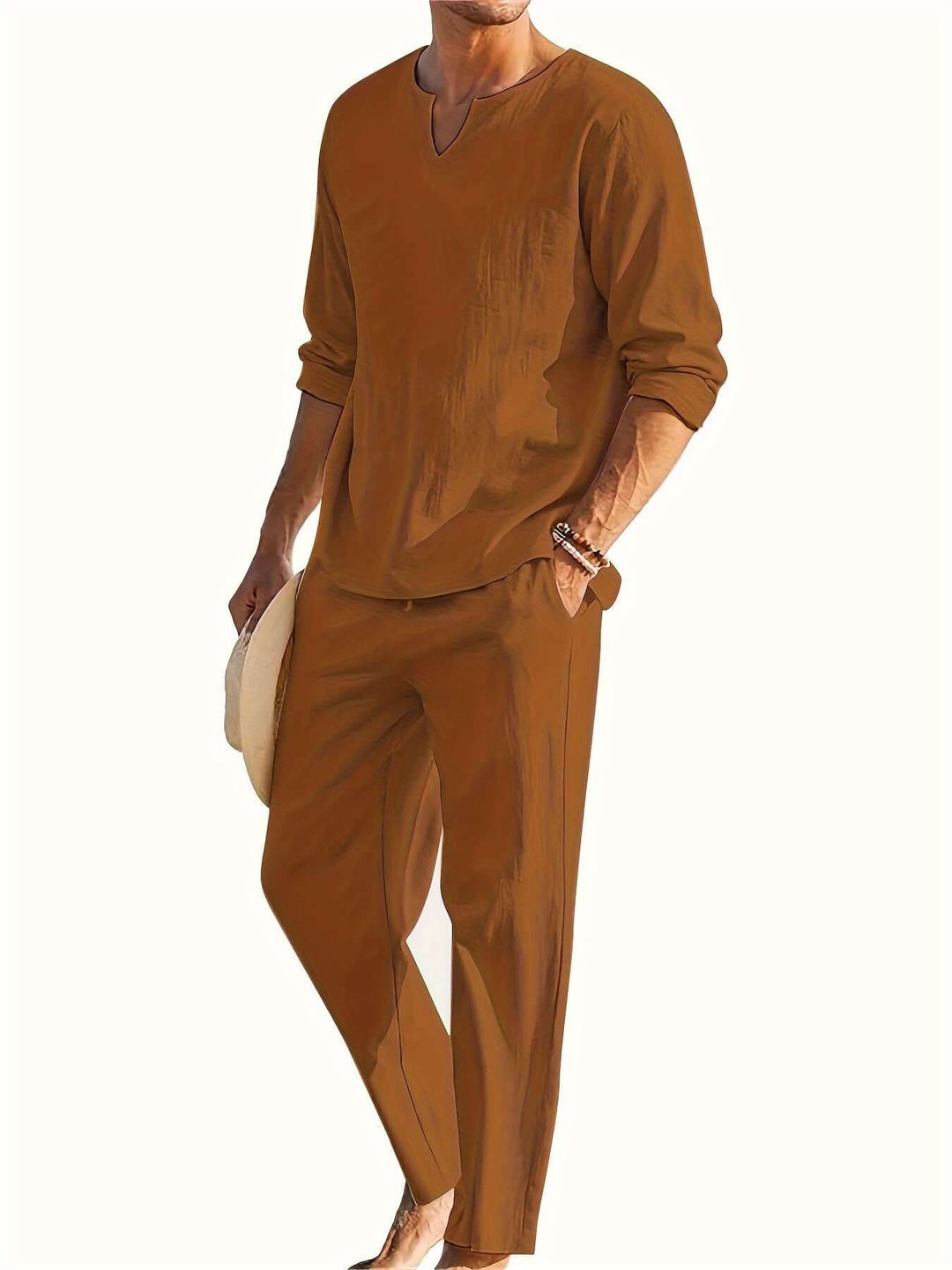 Comfortable men's V-neck two-piece casual set. Includes long-sleeve top & relaxed fit trousers.