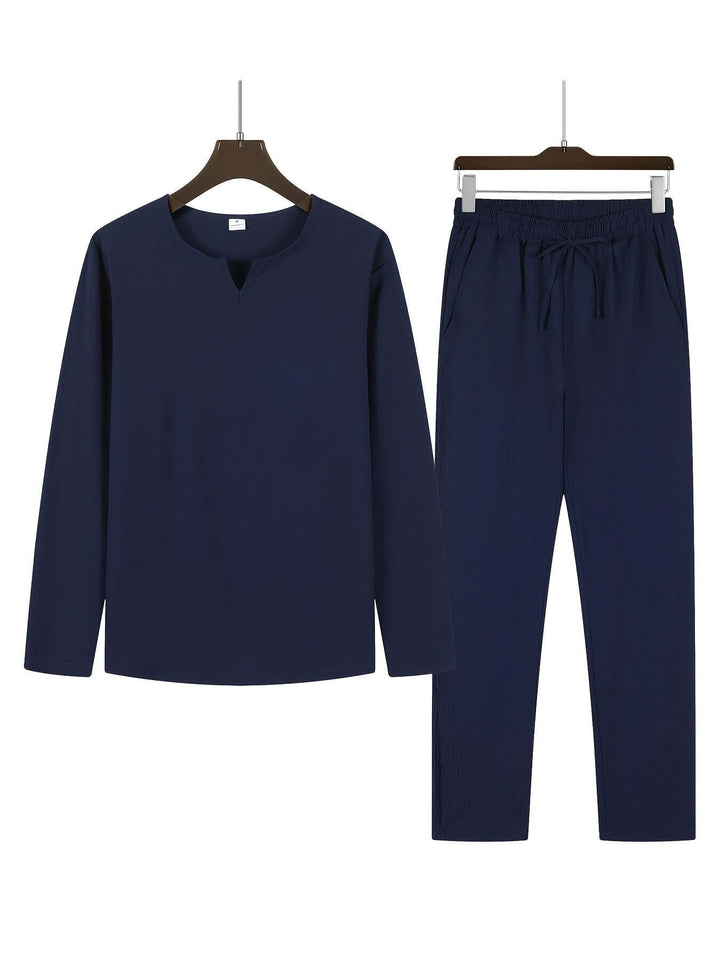 Versatile men's casual two-piece outfit: comfortable V-neck top & relaxed trousers for loungewear.