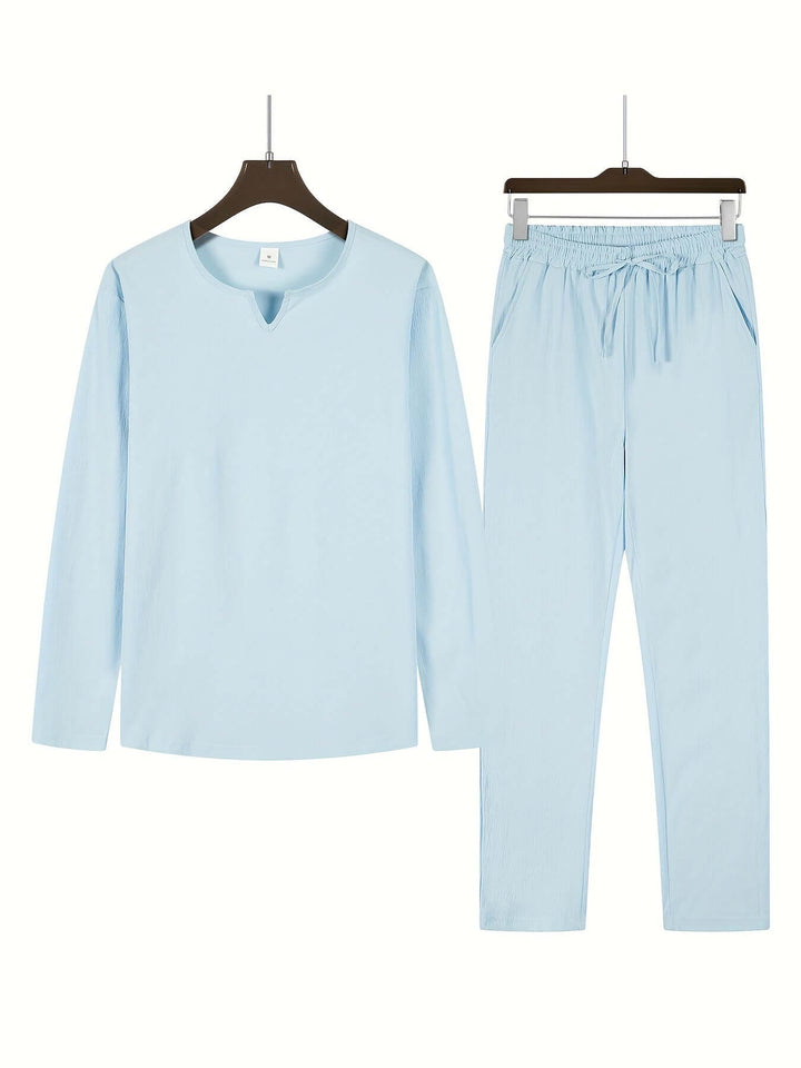 Lightweight men's two-piece casual summer outfit. V-neck long-sleeve top & relaxed trousers.