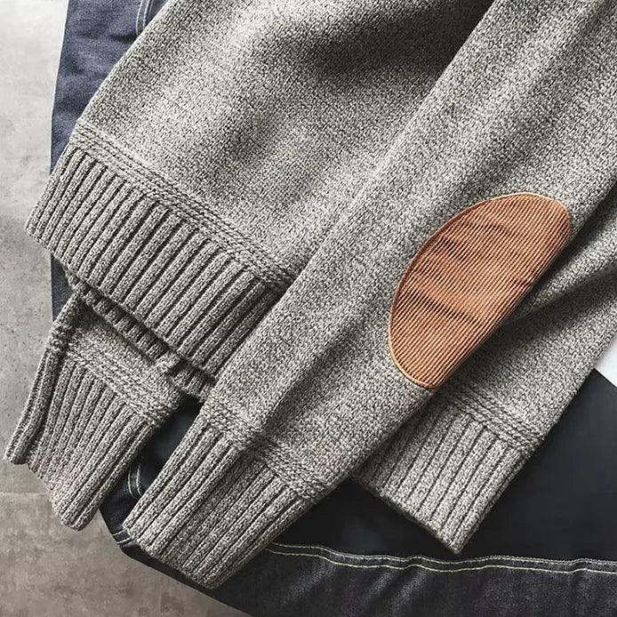 Stylish men's cozy sweater. Alpine knitwear for optimal winter warmth. Comfortable long sleeve pullover, cold weather essential.