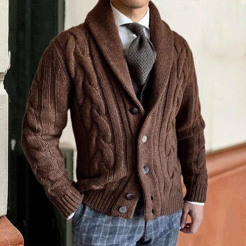 Man wearing a warm, cozy shawl collar cable knit sweater, perfect for fall fashion