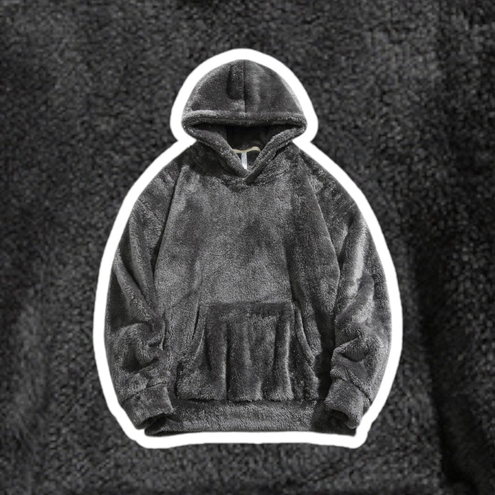 Close-up of a men's casual hoodie, showcasing soft texture & kangaroo pocket detail.