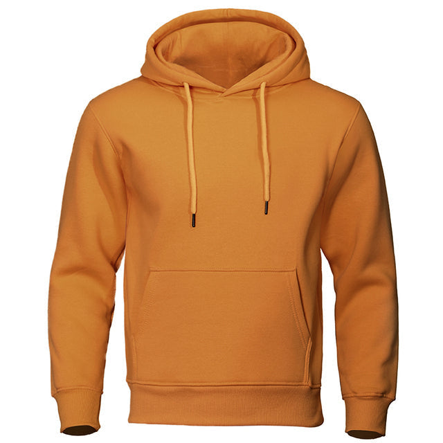 Model wearing a men's cozy hoodie, demonstrating its comfortable fit and casual-cool aesthetic.