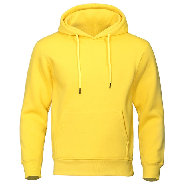 Close-up of the soft fabric texture of a men's warm hoodie, highlighting quality and comfort.