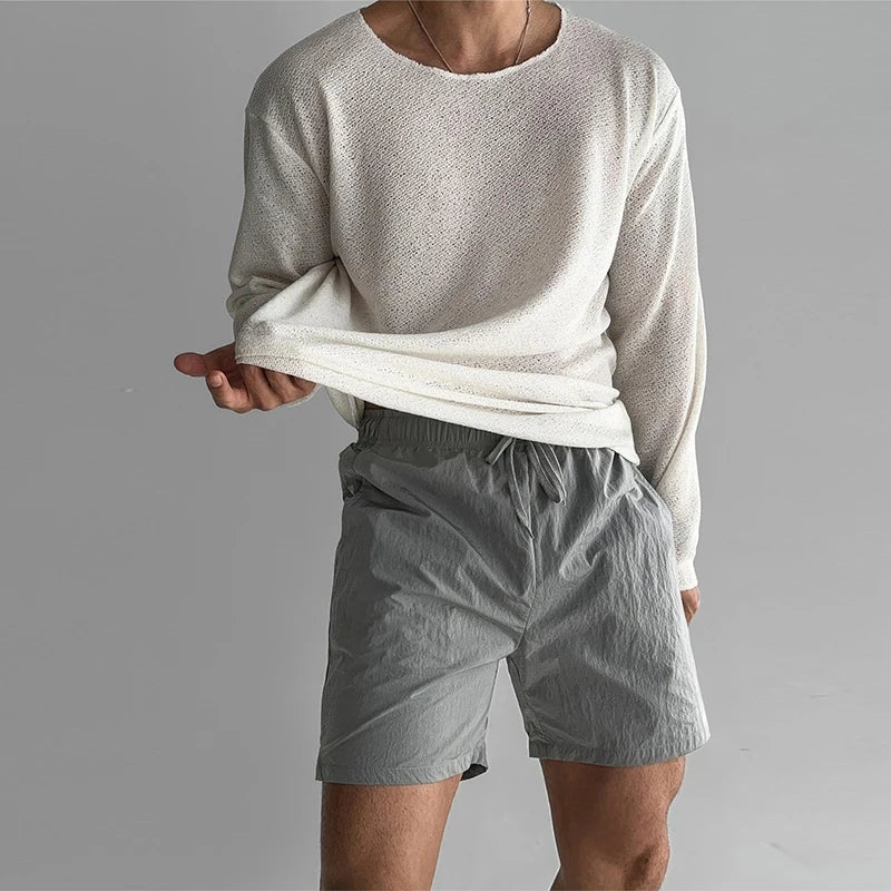 Relaxed fit men's long sleeve crew neck shirt, ideal for modern casual wear.