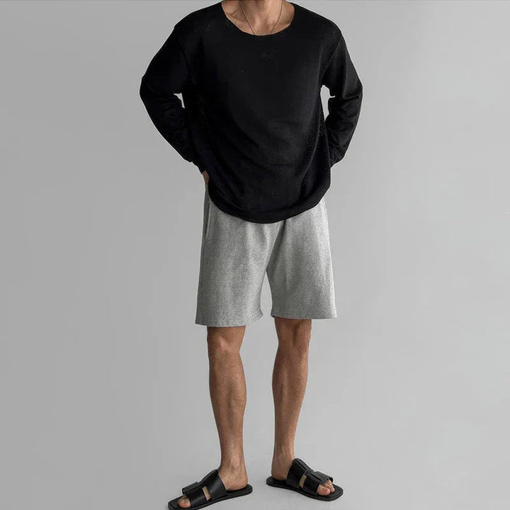 Comfortable men's loose fit long sleeve crew neck shirt, great for daily wear.