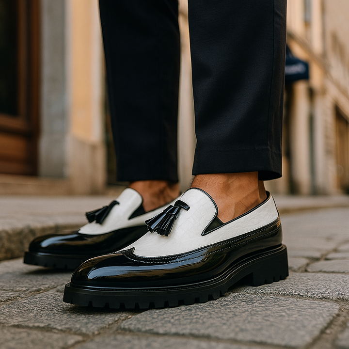 Front view of sophisticated men's Dalton tassel loafers. Distinctive textured luxury slip-ons for formal dress shoes.