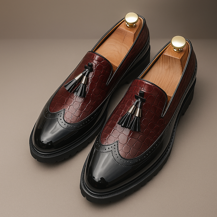 Stylish men's Dalton luxury slip-on tassel loafers paired with a suit, showcasing distinctive textured formal footwear.