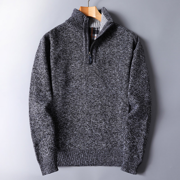 Men's dark gray ribbed quarter zip sweater, offering modern comfort and smart casual style for fall and winter.