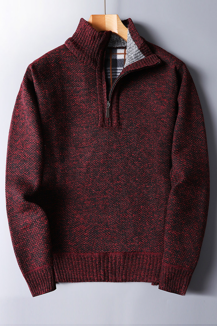 Stylish men's black ribbed quarter zip sweater with a mock neck, perfect for versatile fall and winter layering.