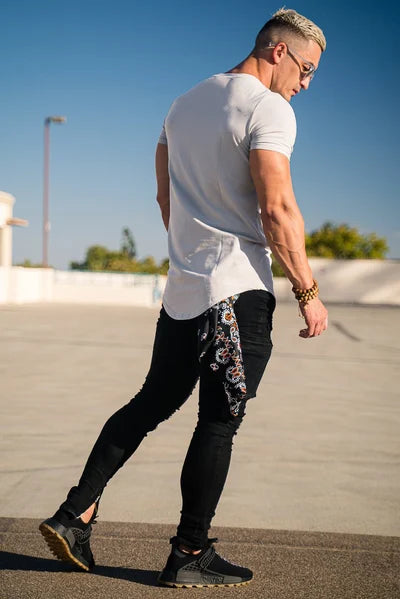 A men's breathable shirt designed with a deep cut for a modern look.