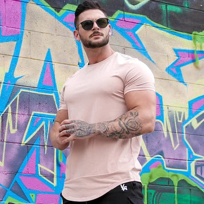 Model wearing a comfortable tee with an athletic fit, deep cut style.