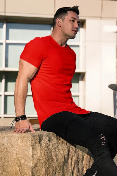 Side view of a men's breathable t-shirt, showcasing its athletic cut.