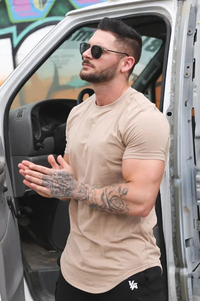 Men's deep cut t-shirt in grey, highlighting the athletic fit and softness.