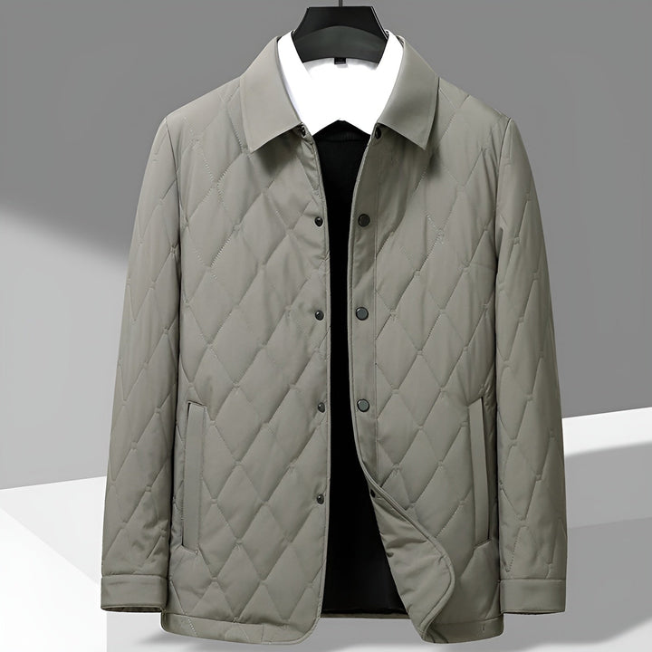 Smart casual men's autumn jacket. Diamond quilted with a shirt collar, great for travel & layering outerwear.