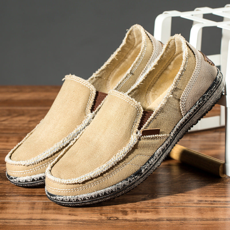 Low profile round toe men's distressed slip-on loafers for ultimate casual comfort footwear.