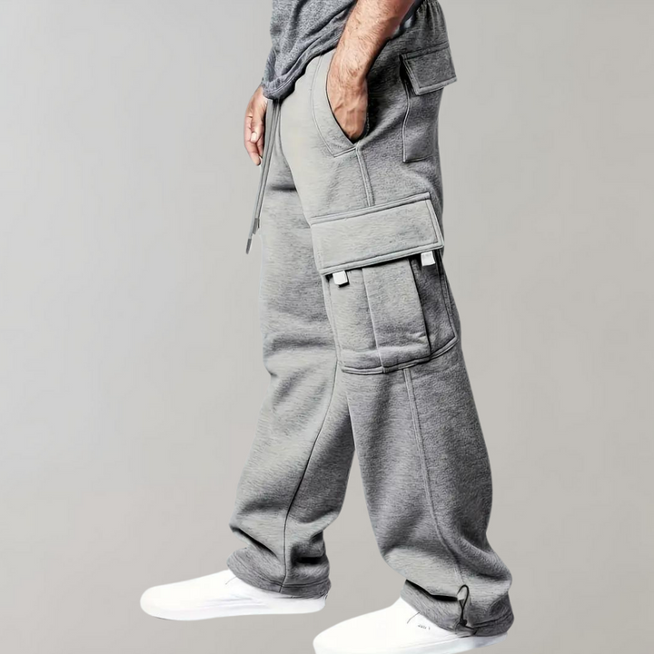 Men's drawstring cargo jogger pants in black, side view