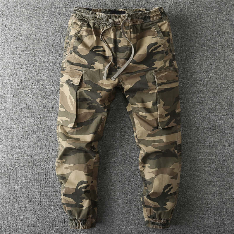 Men's durable camouflage cargo trousers, ideal for outdoor adventures & tactical wear.