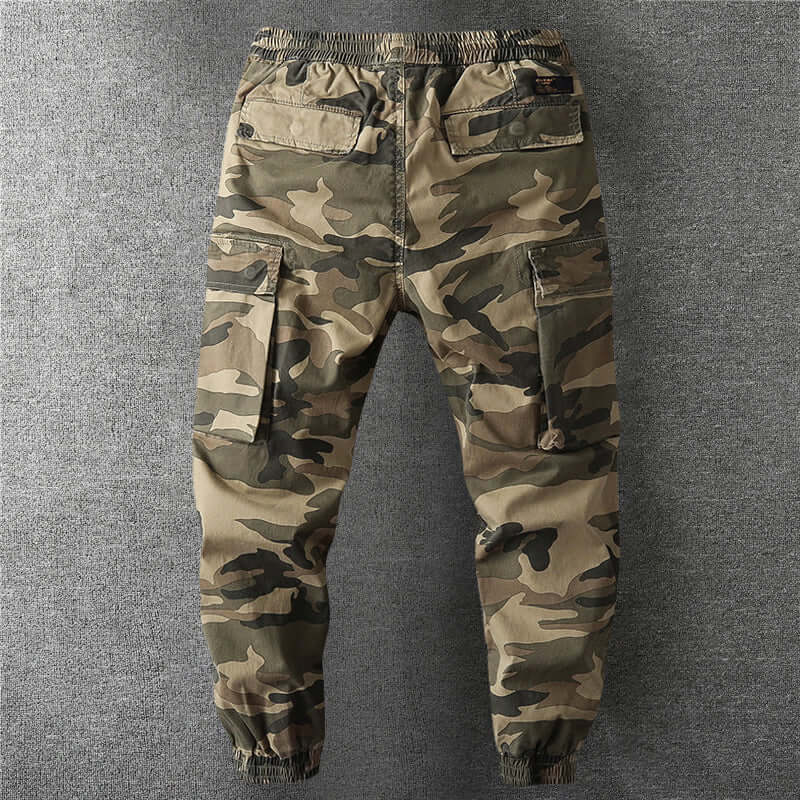 Versatile men's camouflage cargo trousers for casual wear, hiking, or tactical outdoor use.