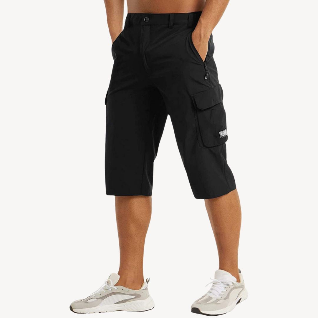 Men's multi-pocket cargo capri pants, durable utility trousers for active summer. Casual style.