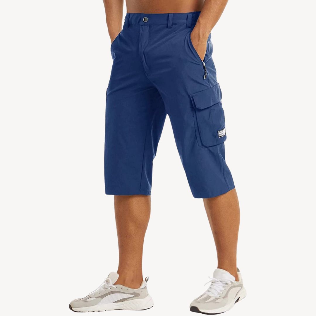 Rugged men's cargo capri pants, durable 3/4 trousers perfect for outdoor adventures & active wear.