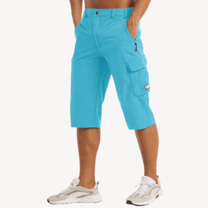 Comfortable men's relaxed fit cargo capri pants, versatile 3/4 trousers for casual & active use.