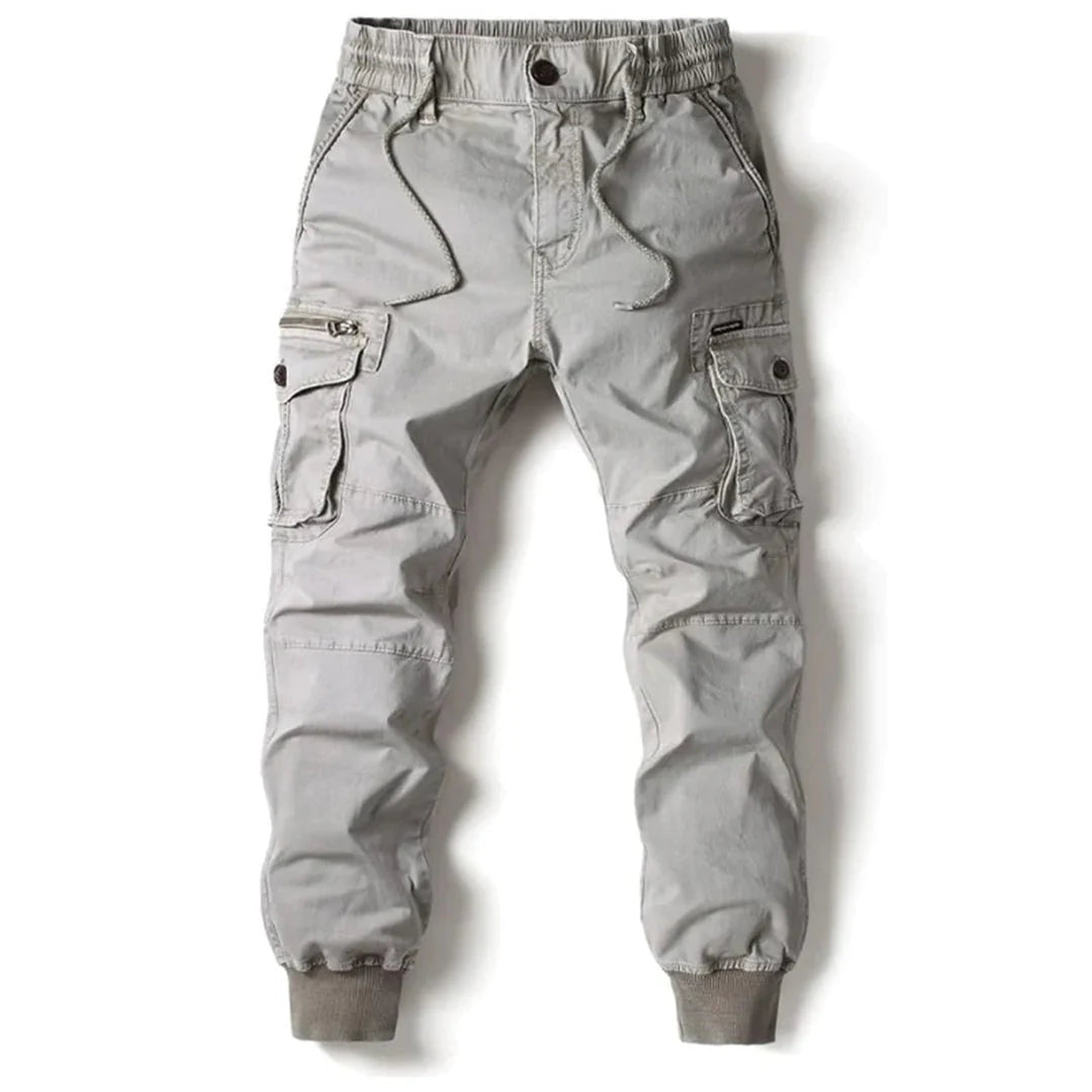 Rugged men's outdoor cargo pants, durable fabric, built for any adventure & versatile casual wear.