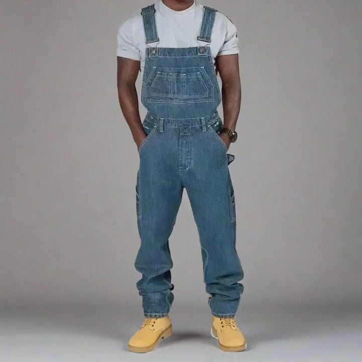Stylish men's workwear denim overalls with adjustable straps for a perfect fit.