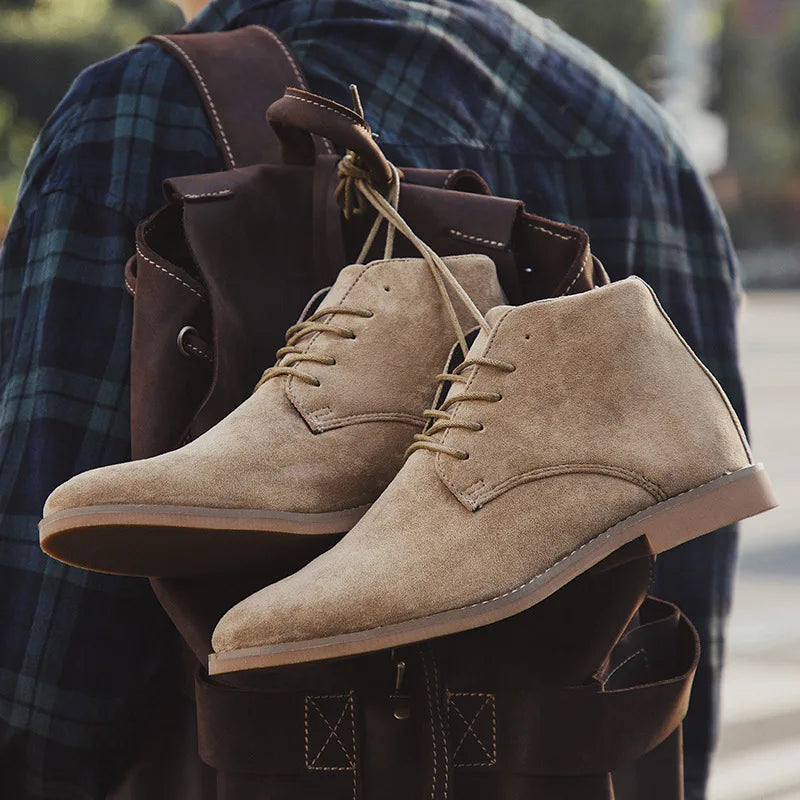 Close-up of handcrafted western boots showing detailed stitching and durable leather.