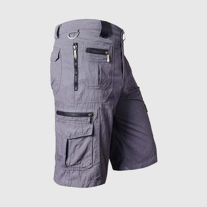 Close-up of men's durable cargo shorts, highlighting multiple utility pockets, ideal for everyday carry.