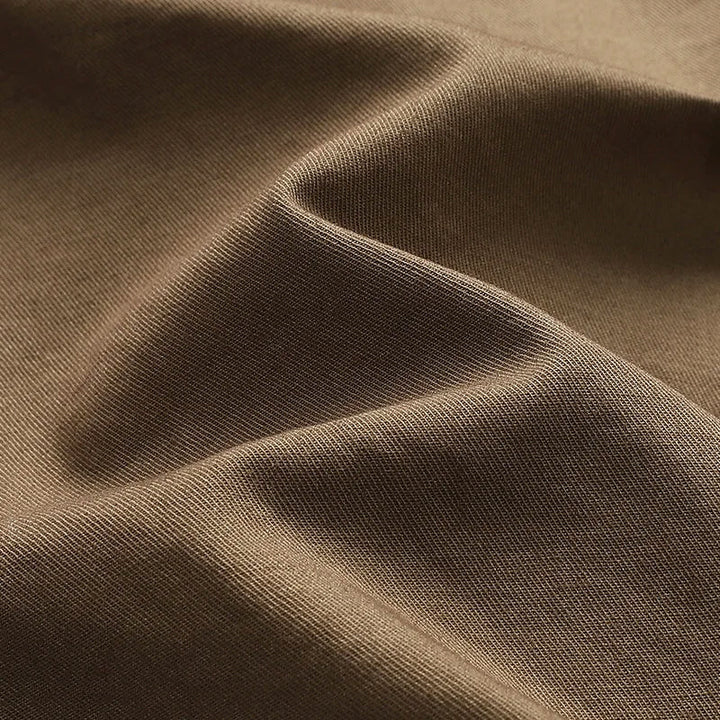 Back view of men's knee-length multi-pocket cargo shorts, demonstrating comfortable fit & durable design.