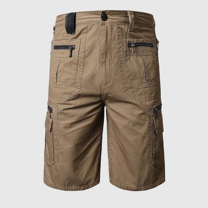 Rugged men's outdoor adventure cargo shorts, knee-length, multi-pocket, durable for active summer wear.