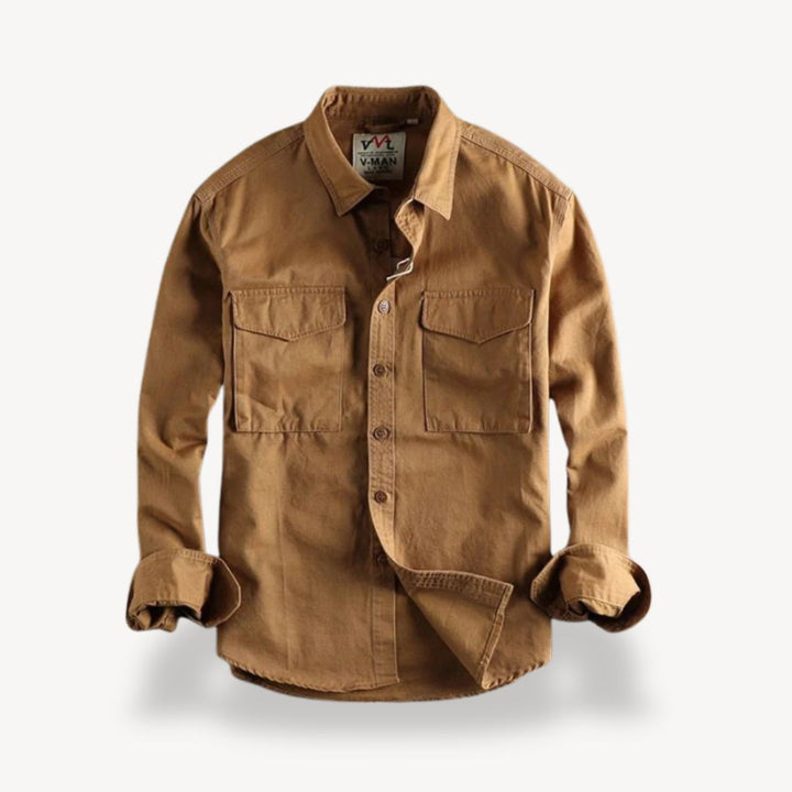Durable men's work shirt, long-sleeve, featuring ample utility pockets for everyday tasks and outdoor gear.