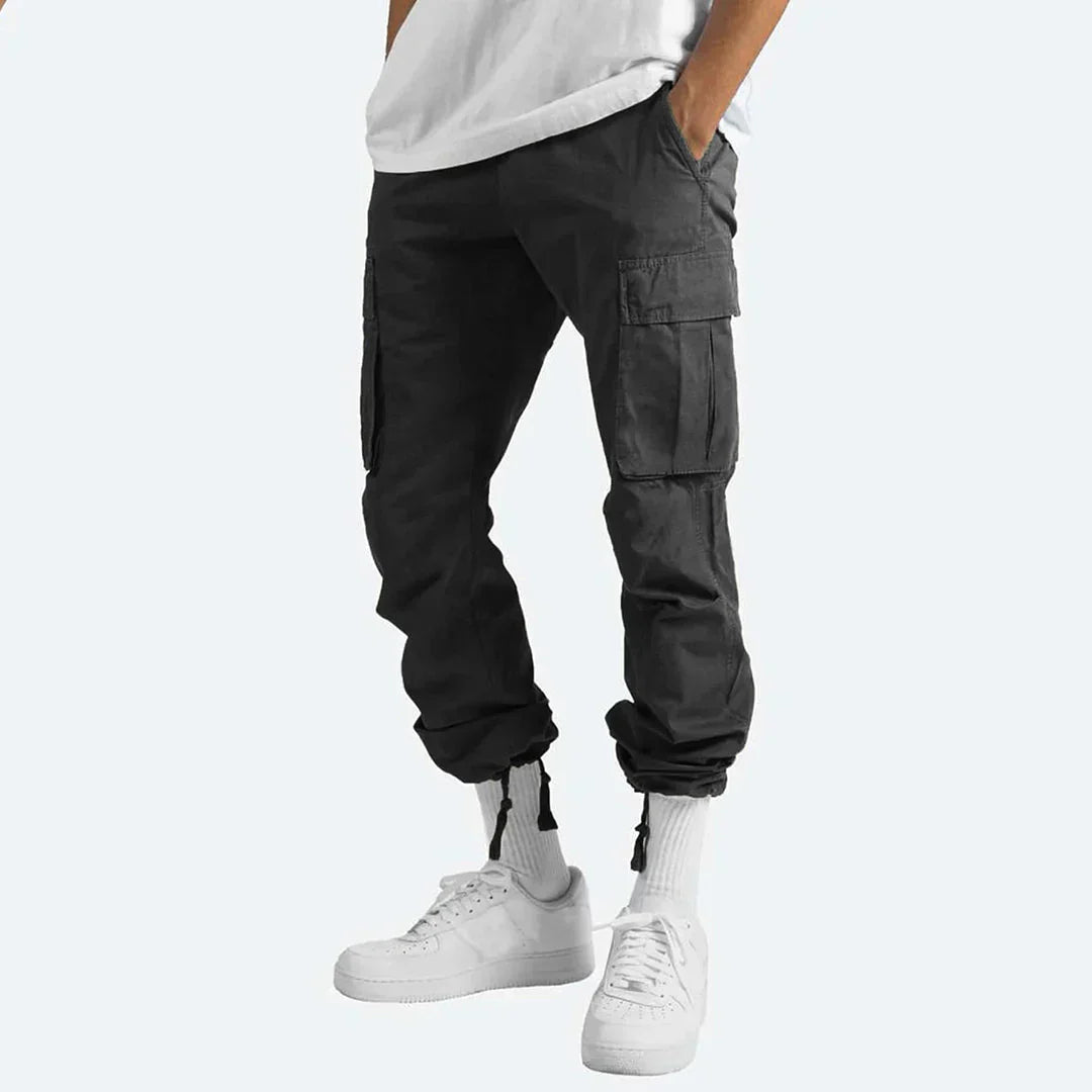 Men's durable multi-pocket cargo pants, ideal for outdoor utility & casual wear. Versatile rugged trousers.