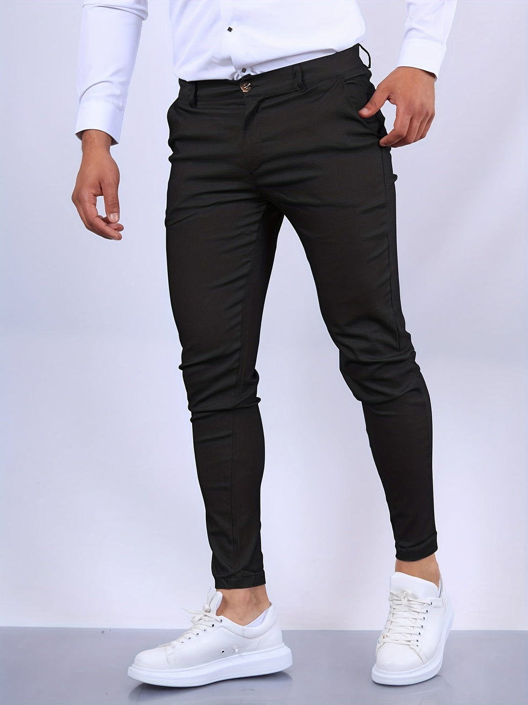 Modern tailored men's skinny fit pants, offering a sleek look with comfortable stretch fabric.