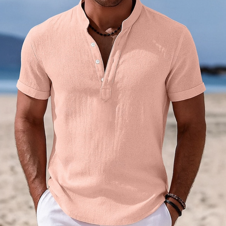 Stay cool & stylish in this men's summer button-up short sleeve shirt, comfortable for warm weather.