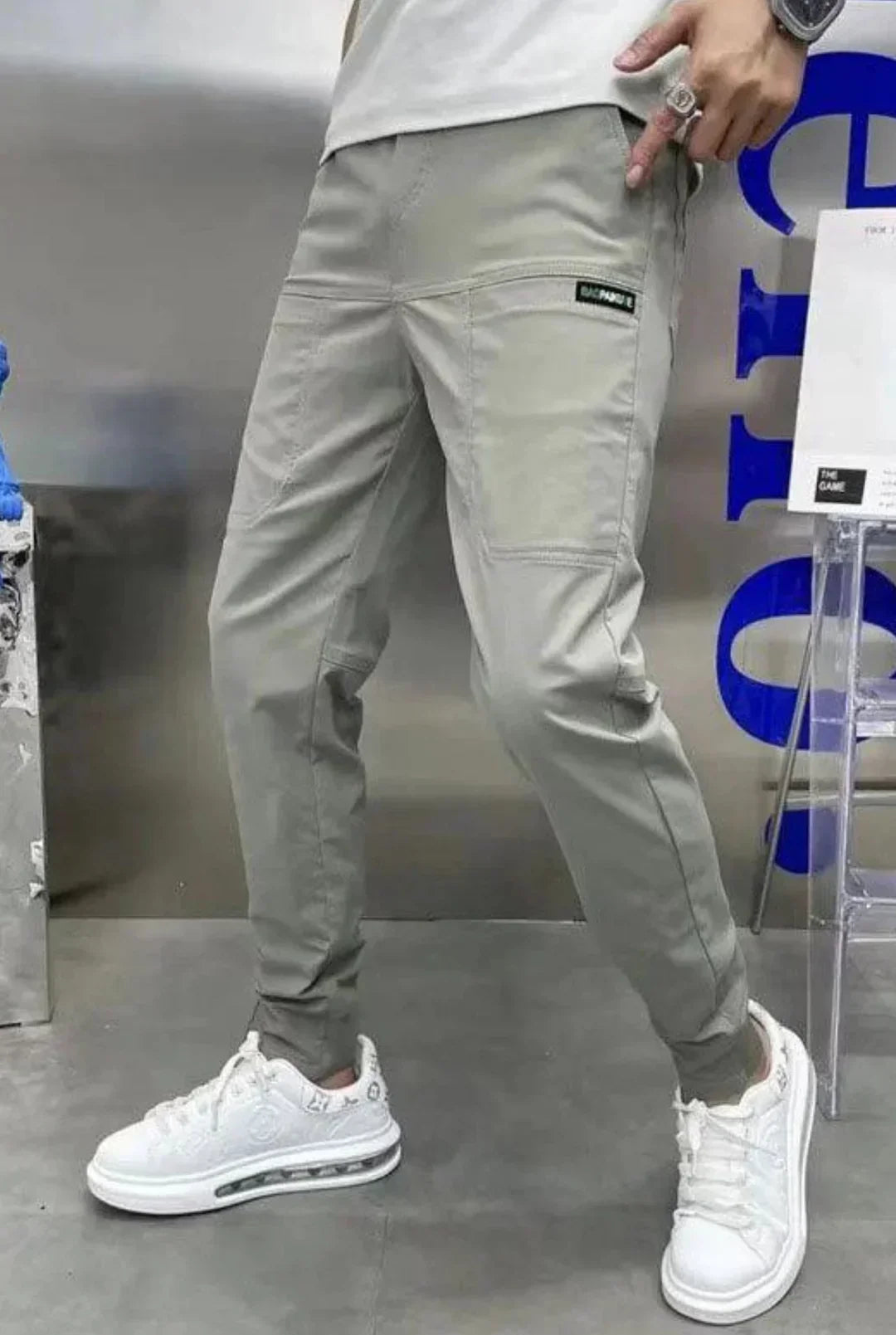 Men's fashion elastic cargo pants. Relaxed fit, comfortable stretch, & practical pockets for versatile, everyday wear.