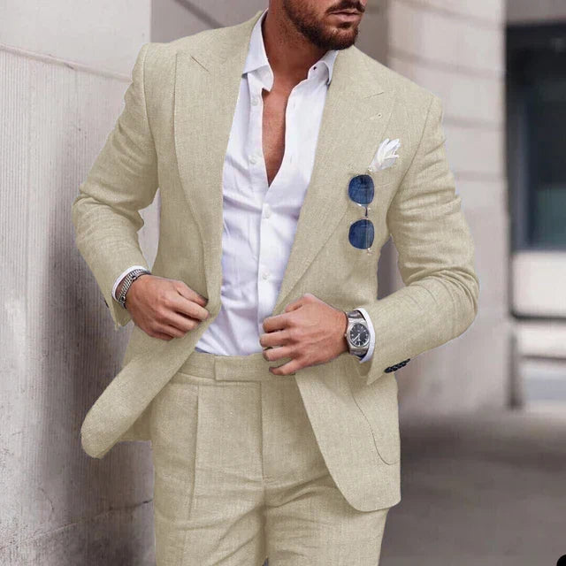 Close-up of a men's tailored 2-piece suit jacket. High-quality fabric for weddings & formal events.