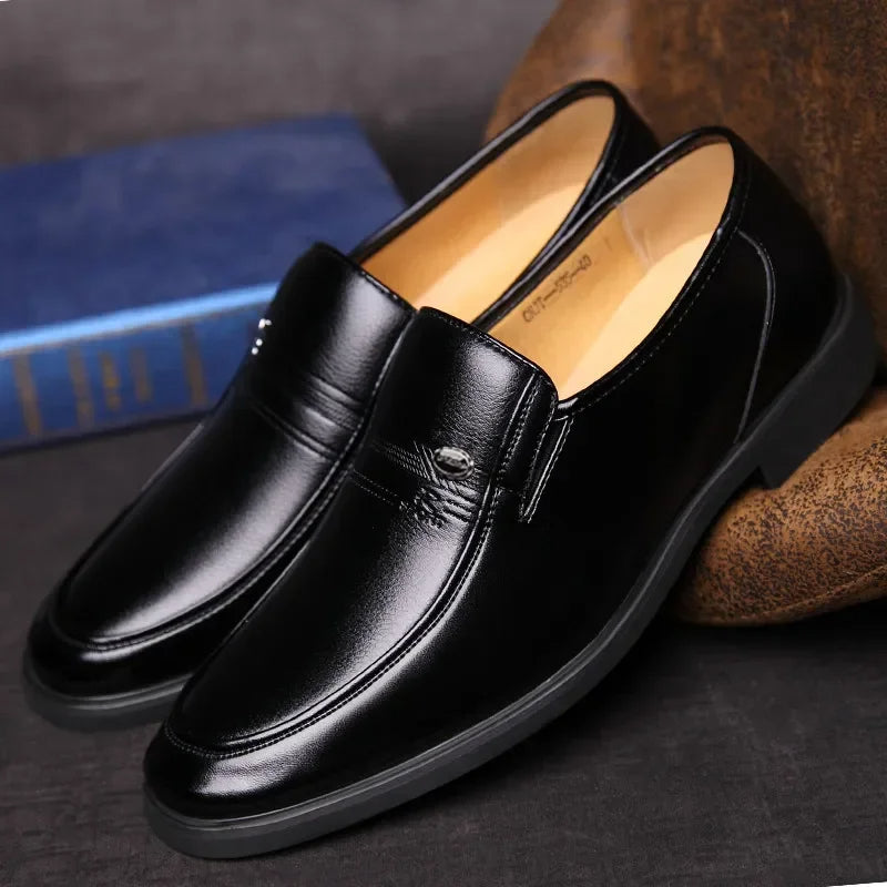 Classic men's brown leather formal dress shoes, perfect slip-on loafers for sophisticated fashion.