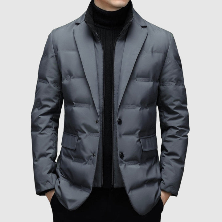 Warm men's padded winter jacket with down filling, perfect for cold weather. Stylish and functional.