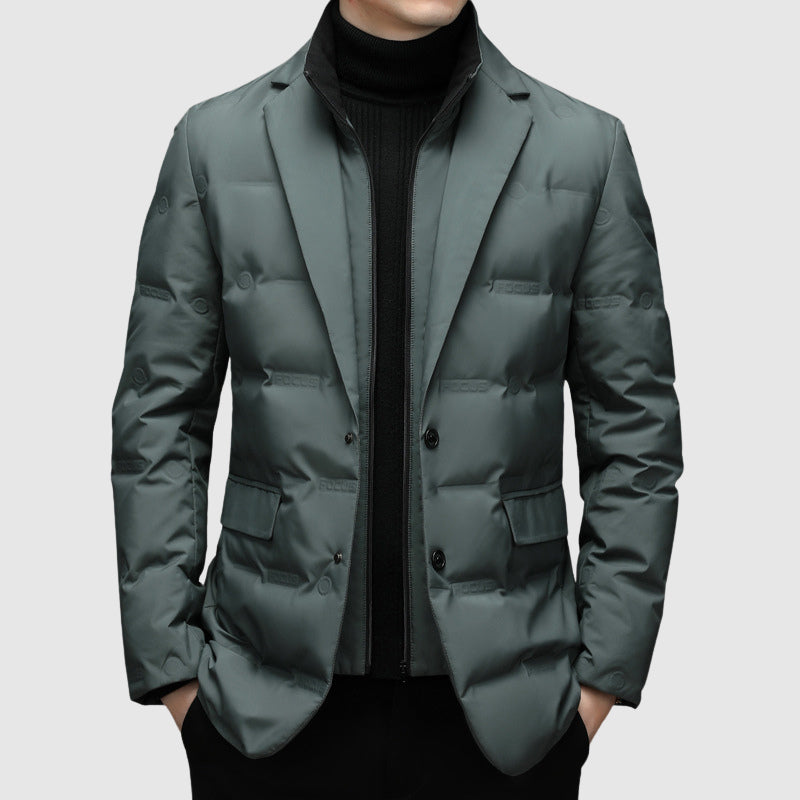 Black men's padded winter jacket, quilted design, offering warmth & elegant blazer style for cold weather.