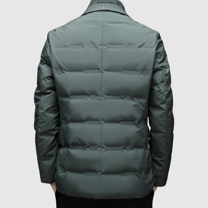 Elegant green men's padded winter jacket, quilted, providing warmth & a refined look for cold weather.