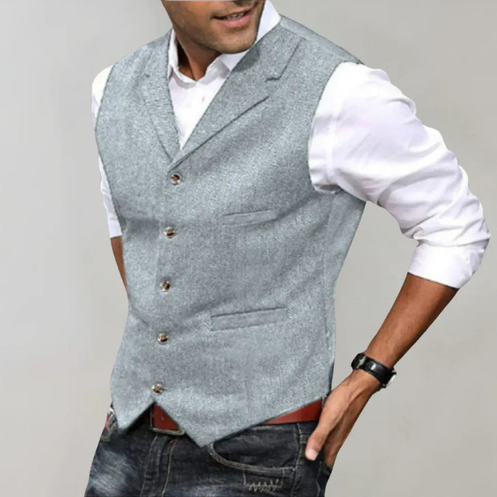 Polished men's formal suit vest for a sharp, refined look. Elegant waistcoat enhances any formal or business attire.
