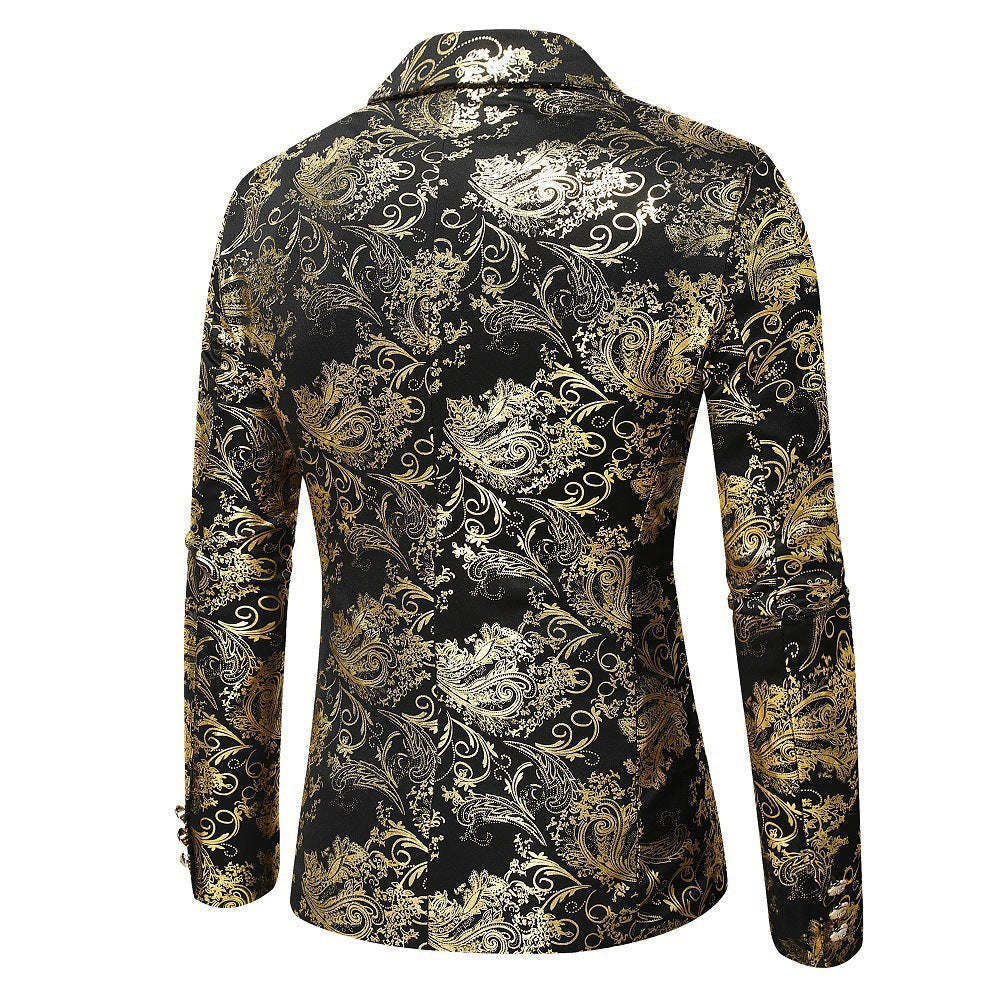 Close-up of men's formal blazer showcasing the intricate gold pattern on black fabric. Perfect for special occasions.