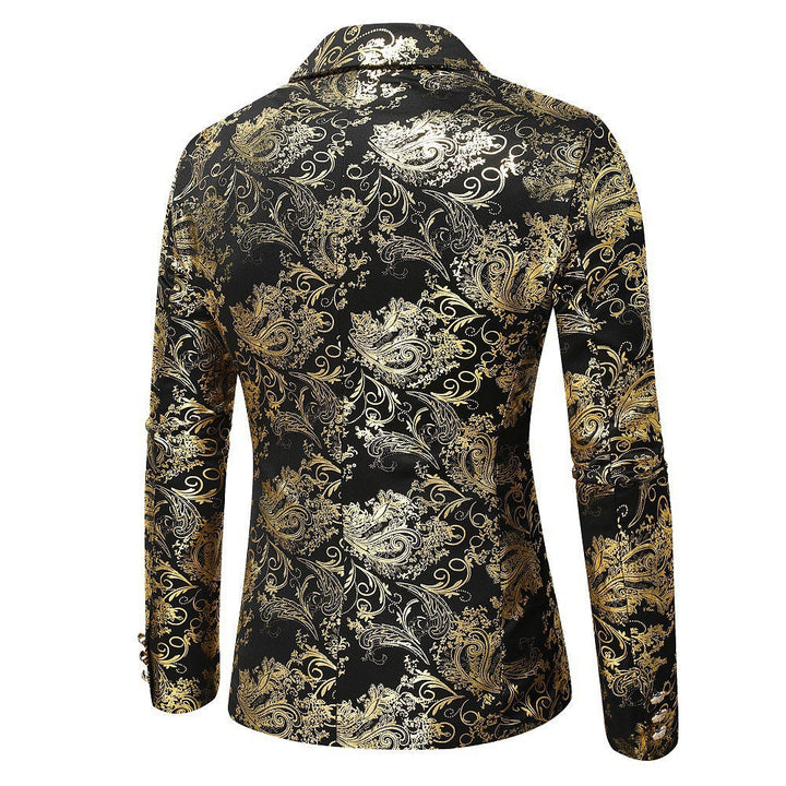 Close-up of men's formal blazer showcasing the intricate gold pattern on black fabric. Perfect for special occasions.