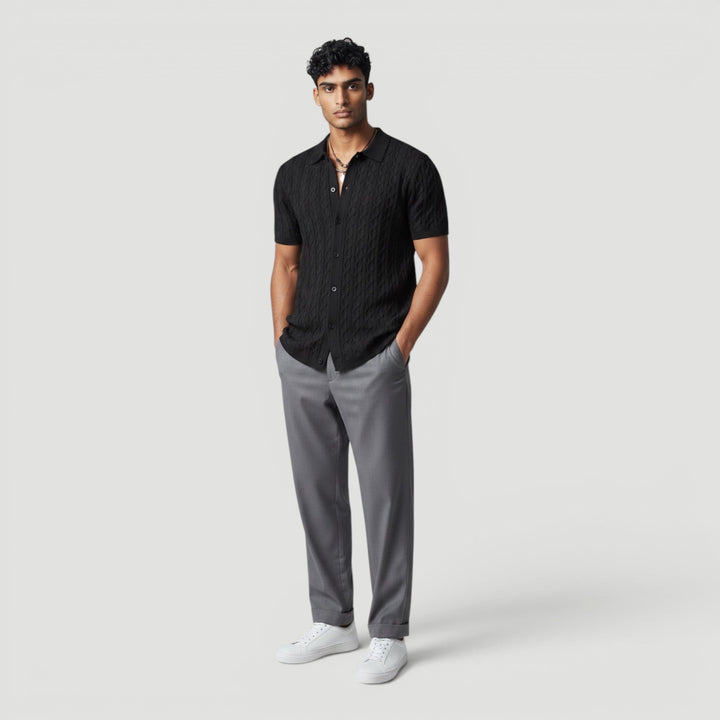 Men's elegant sleeveless sweater vest for stylish layering.