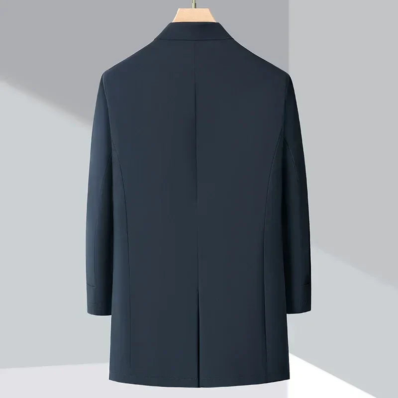 Warm, water-repellent men's trench coat with down filling. Ideal for cold weather & everyday elegant style.