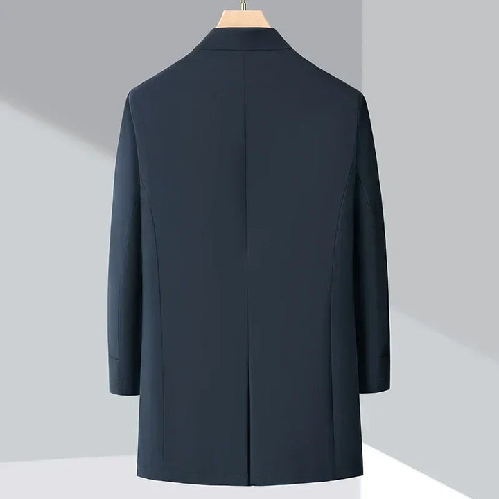 Warm, water-repellent men's trench coat with down filling. Ideal for cold weather & everyday elegant style.