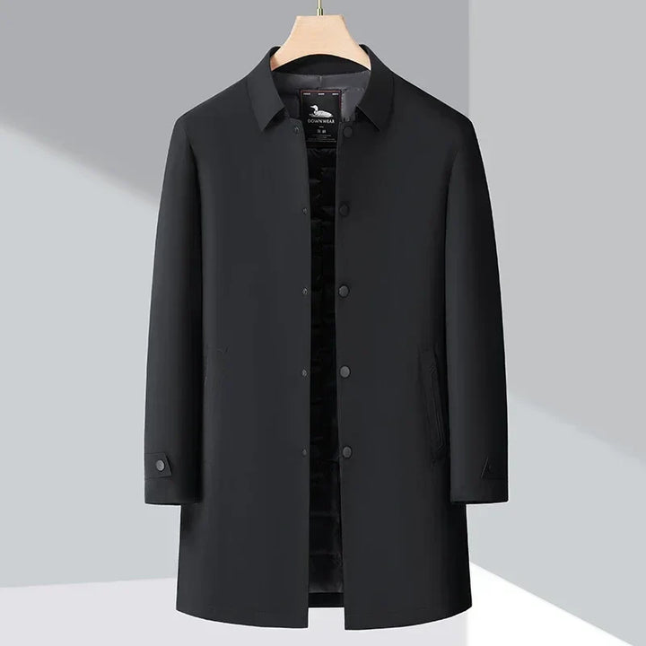 Stylish men's trench coat, tailored fit, down-filled for warmth. Classic outerwear for fall/winter fashion.