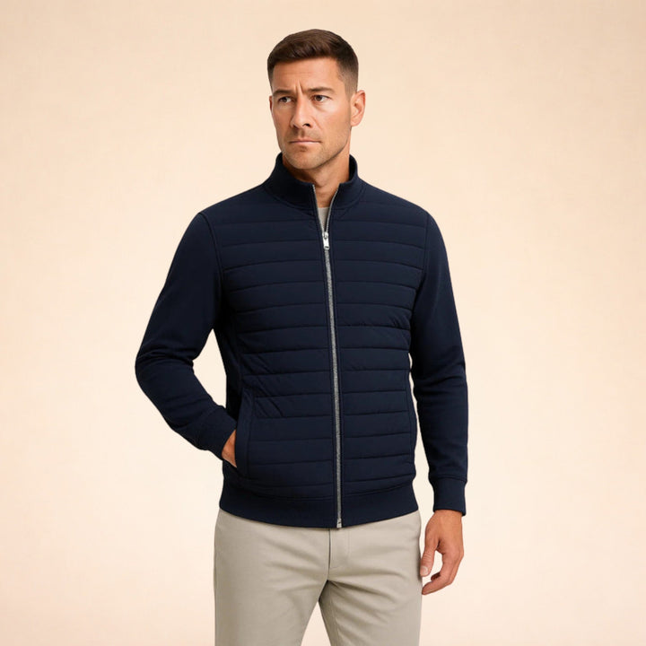 Stylish men's warm quilted hybrid jacket. Lightweight and versatile outerwear with comfortable stretch knit sleeves.